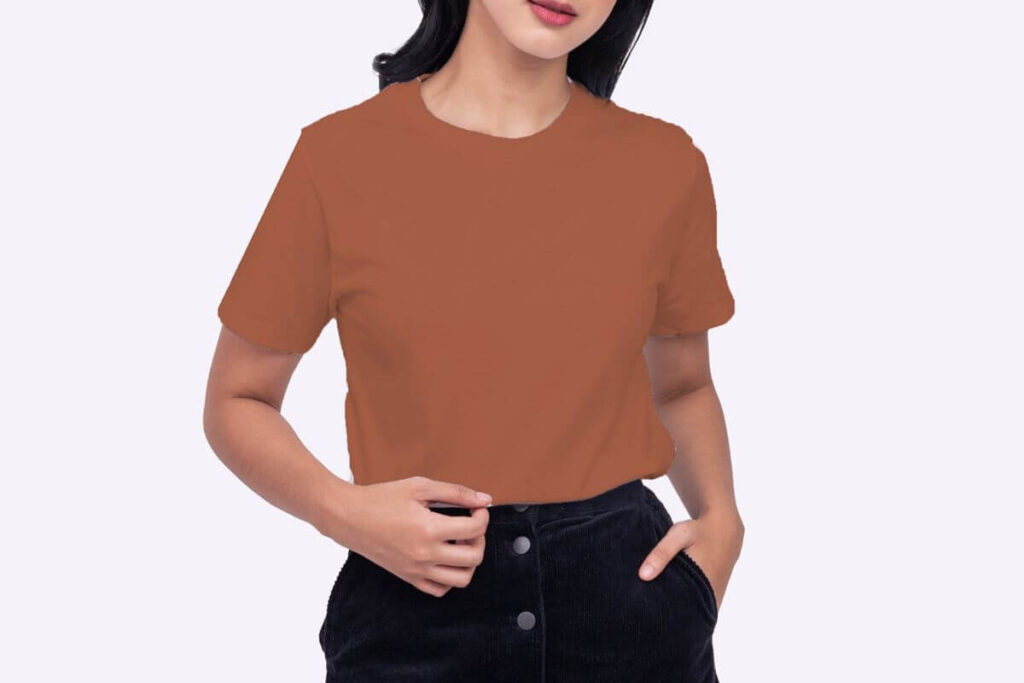 Female model wearing a brown plain shirt with black pants