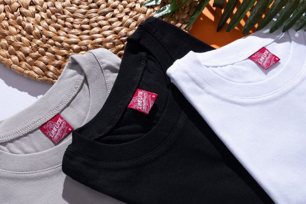 Gray, black, and white Lifeline shirts showing round neck collar details