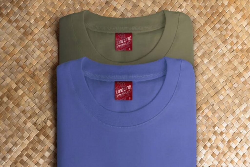 Folded olive and blue Lifeline shirts showing ready-stock color options